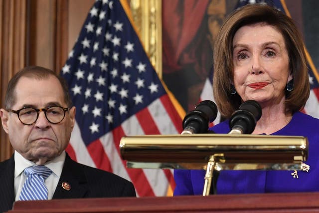Speaker of the House Nancy Pelosi, flanked by House Judiciary chairman Jerry Nadler, announces articles of impeachment against US president Donald Trump during a press conference at the US Capitol in Washington, DC, on 10 December 2019