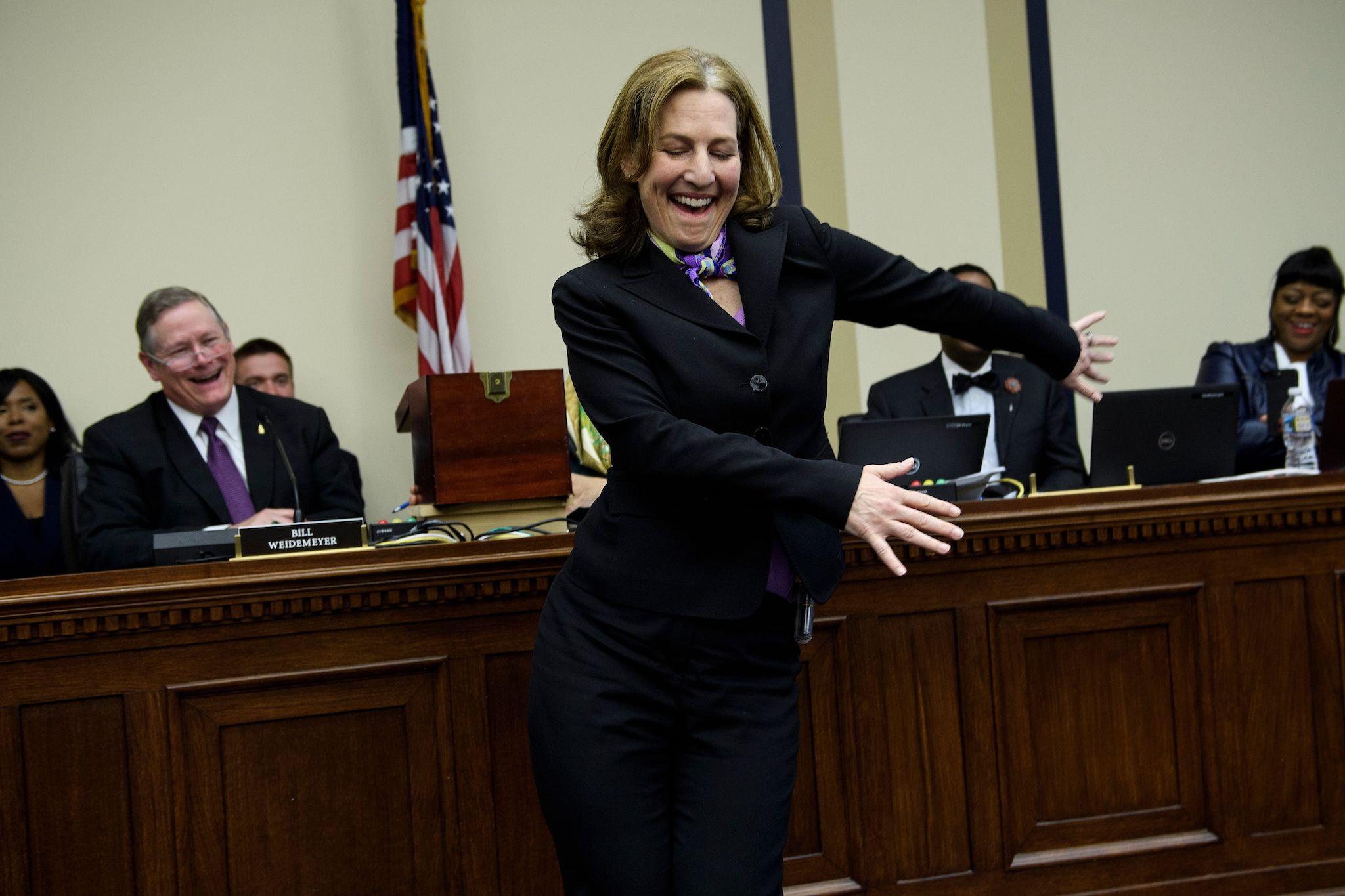 US Representative-elect Kim Schrier (D-WA) does the flossing dance before drawing a number during an office lottery for new members of Congress on Capitol Hill November 30, 2018 in Washington, DC