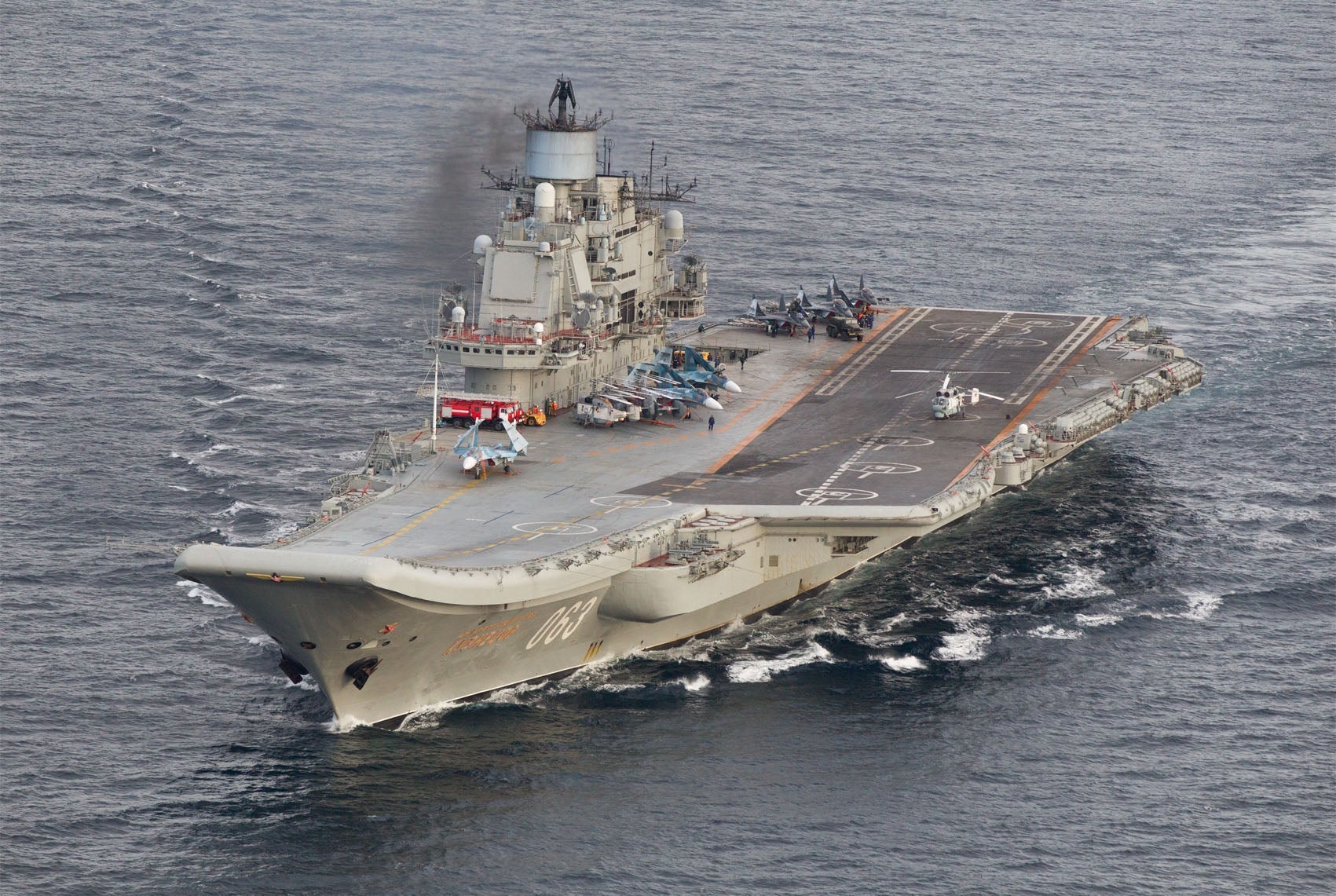 One &apos;missing&apos; as Russia&apos;s only aircraft carrier catches fire