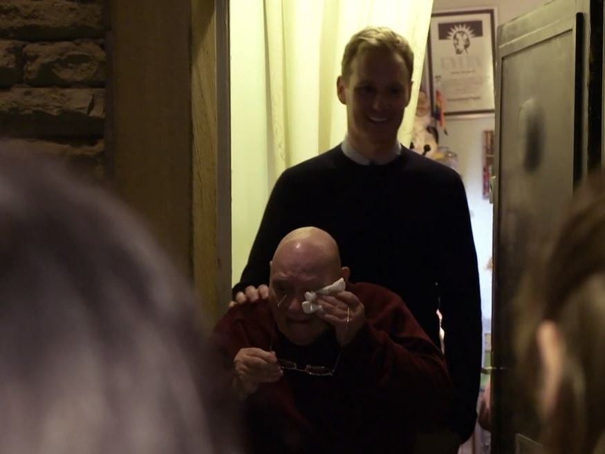 Terrence weeps as he and BBC’s Dan Walker listen to the carolers sing