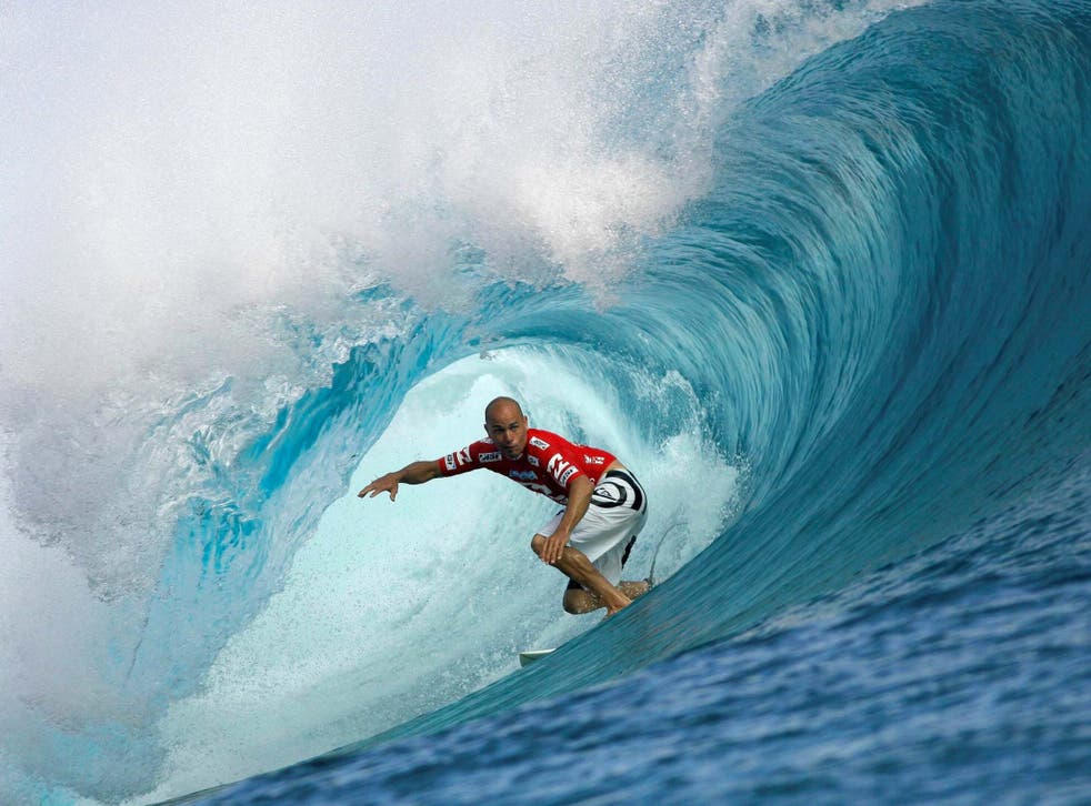 Surfing great Kelly Slater pictured at the legendary Teahupo'o beach in Tahiti