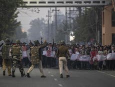 Train stations set alight as thousands protest Indian citizenship bill
