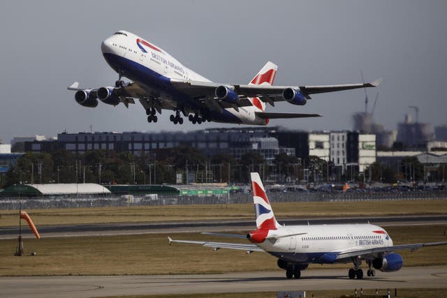 A British Airways airplane takes off from the runway at Heathrow Airport
