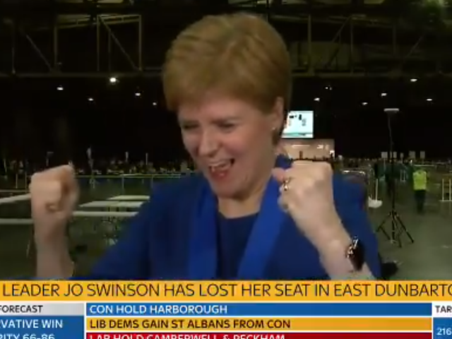 Nicola Sturgeon celebrates as she learns the SNP candidate has won in Jo Swinson's East Dunbartonshire constituency