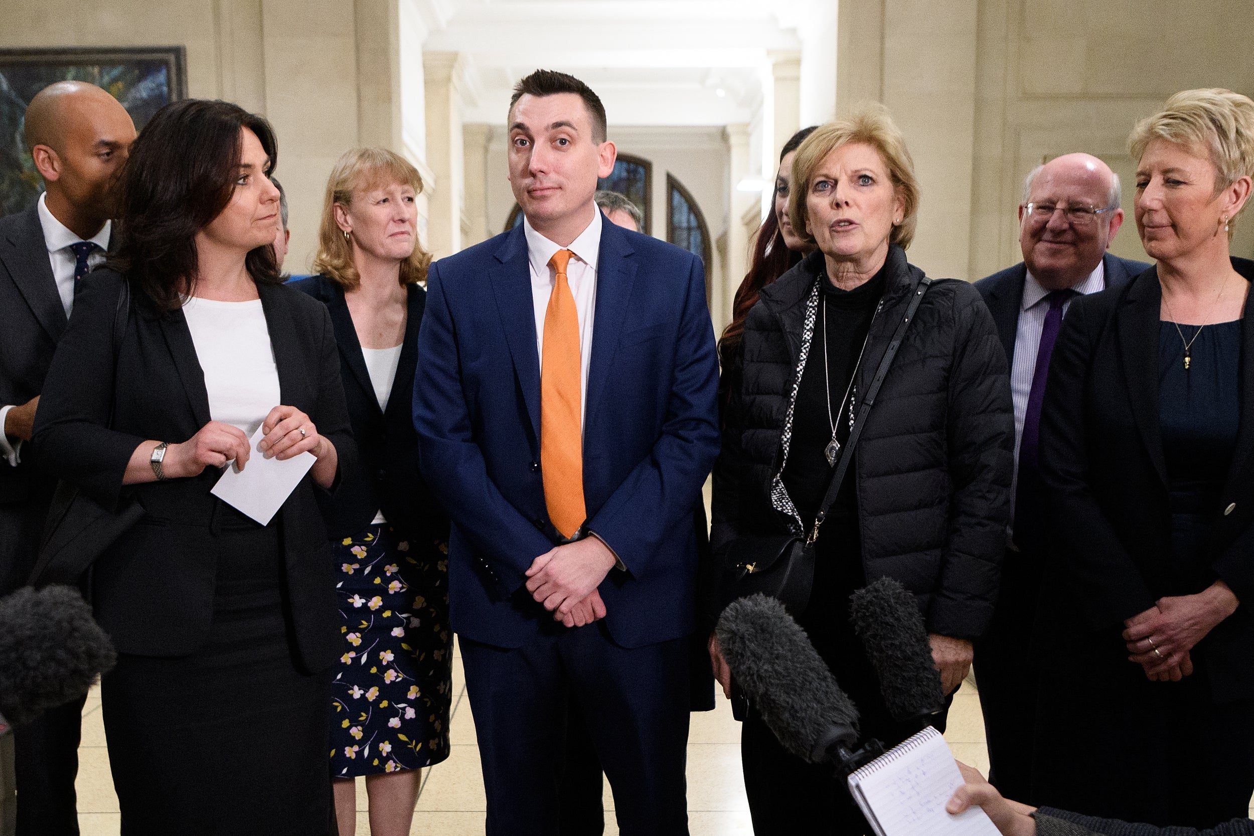 Former Labour and Conservative MPs Chuka Umunna (L), Heidi Allen (2L), Joan Ryan (3L), Gavin Shuker (C), Anna Soubry (3R), Mike Gapes (2R) and Angela Smith (R) of the independent group of MPs speak to journalists following their inaugural meeting in February