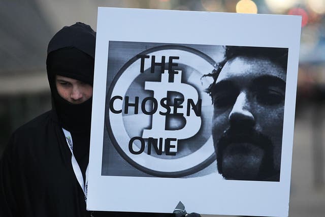 A supporter of Ross Ulbricht in front of a New York court house during the Silk Road founder's trial on 13 January, 2015