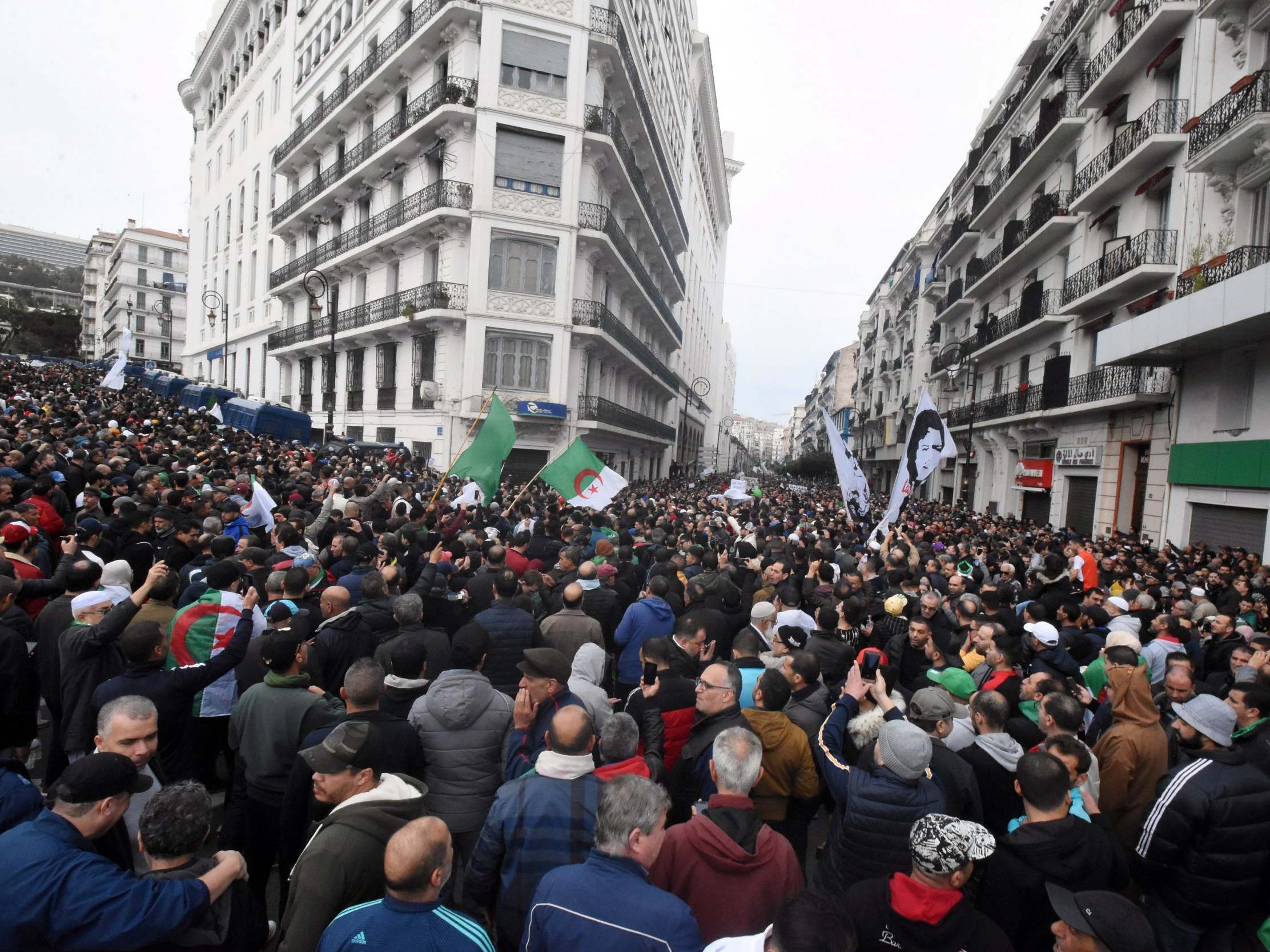 Demonstrators attend a protest in Algiers to reject the presidential election result