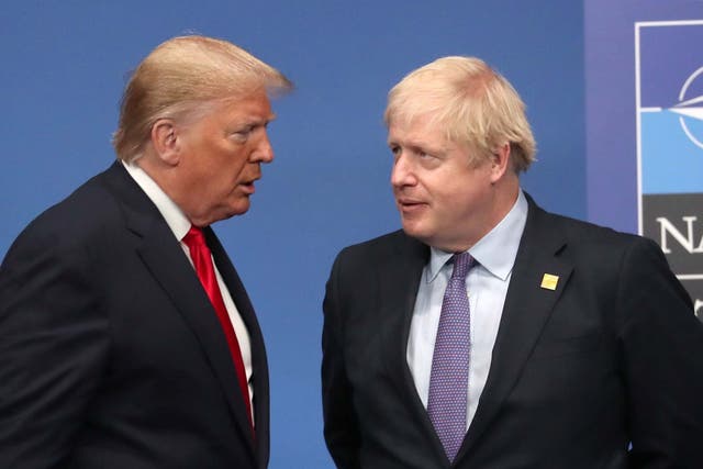 US President Donald Trump and British Prime Minister Boris Johnson onstage during the annual NATO heads of government summit