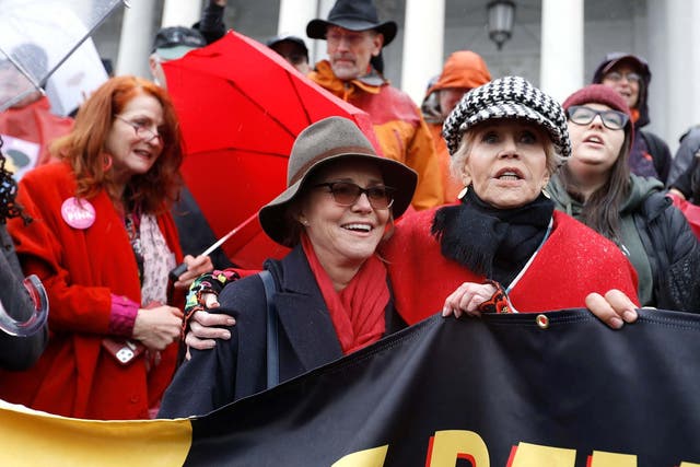 Sally Field and Jane Fonda demonstrate on the steps of Capitol Hill during the latest "Fire Drill Friday" climate change protest in Washington on 13 December 2019