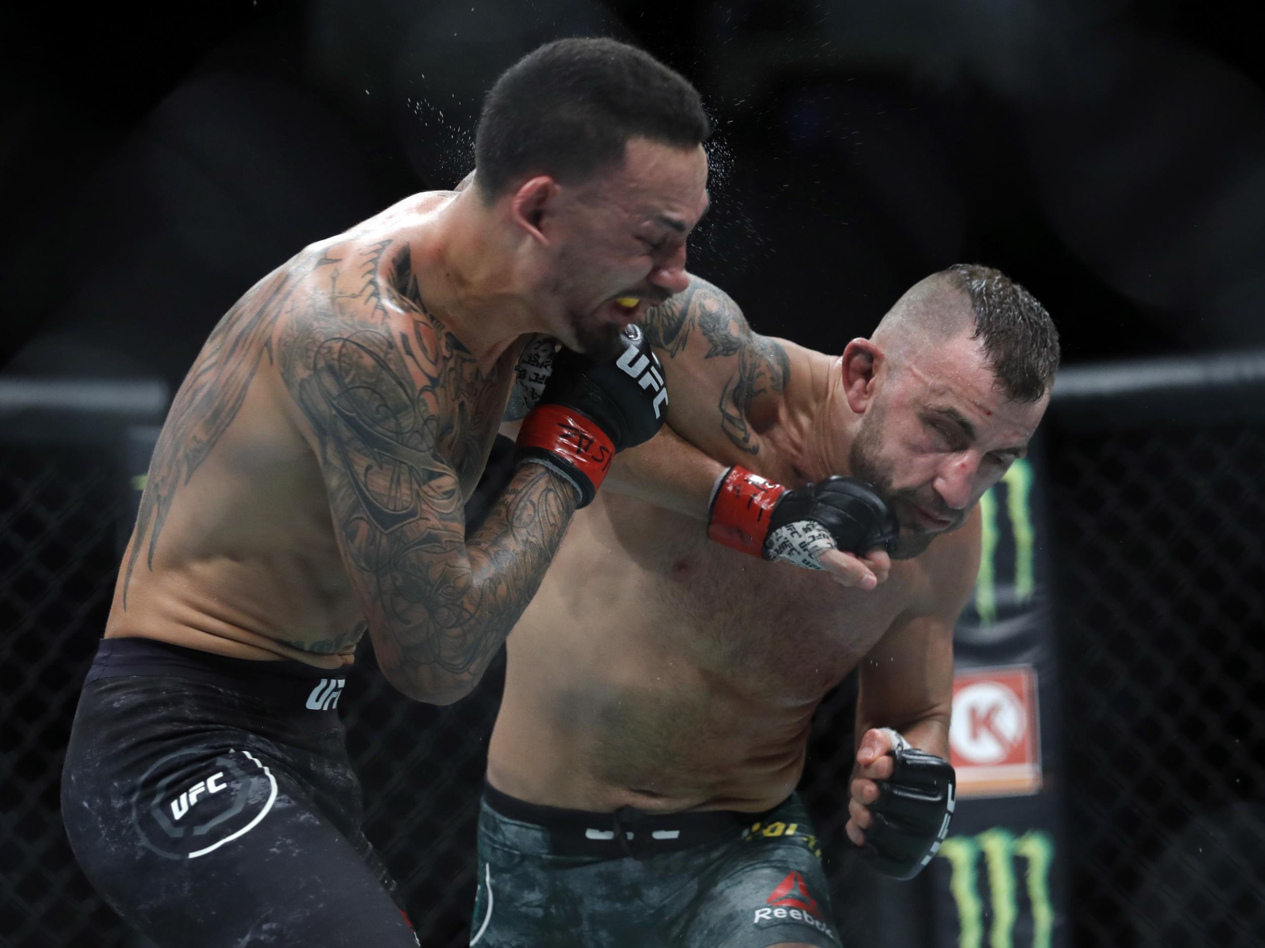 Max Holloway (left) dropped his belt to Alexander Volkanovski via unanimous decision