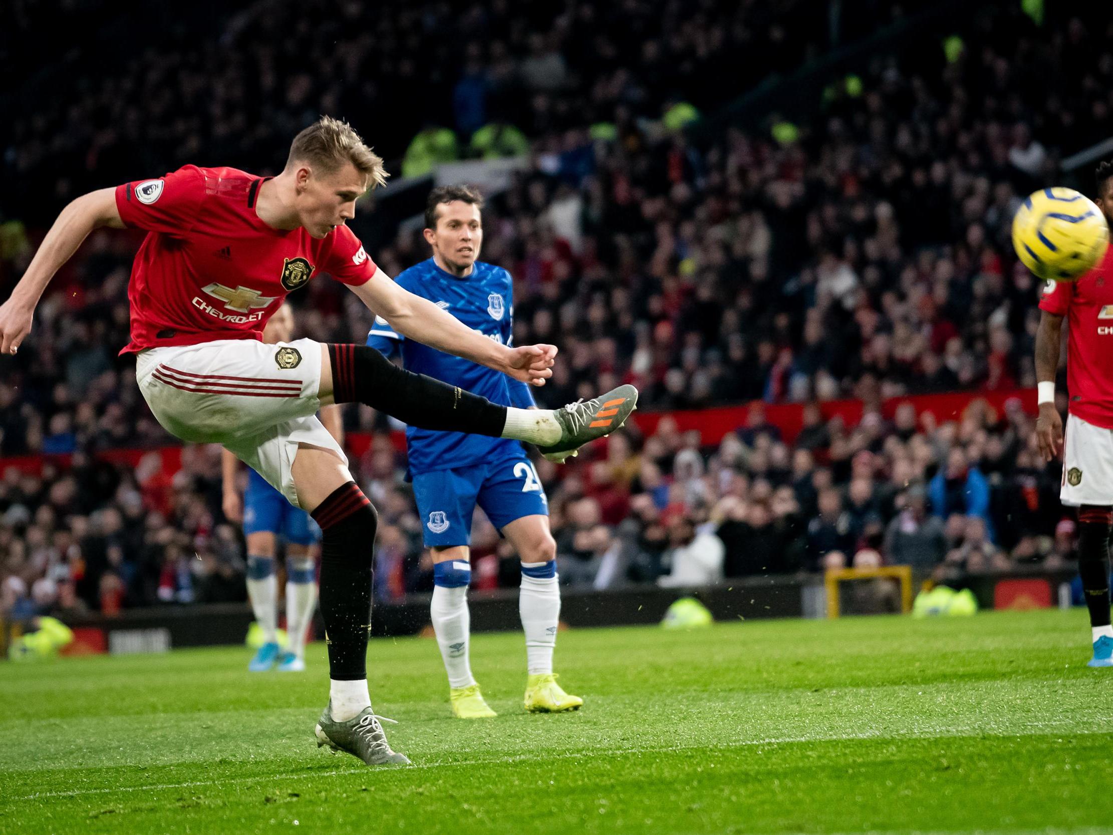 Scott McTominay takes a shot on goal for United