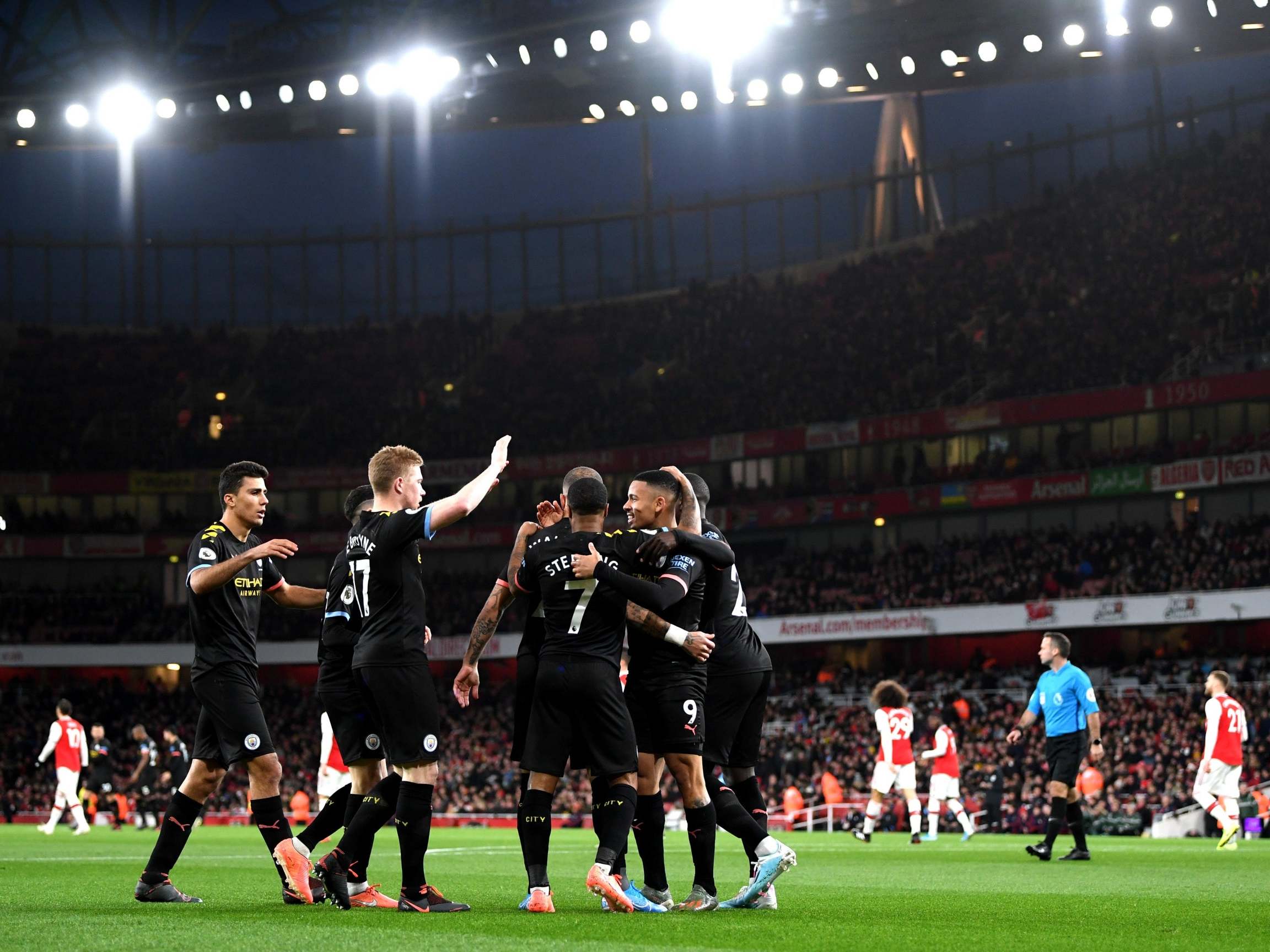 Manchester City celebrate their opening goal of the game