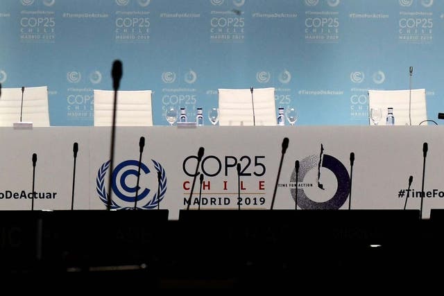 Empty chairs are pictured during the UN Climate Change Conference COP25 in Madrid
