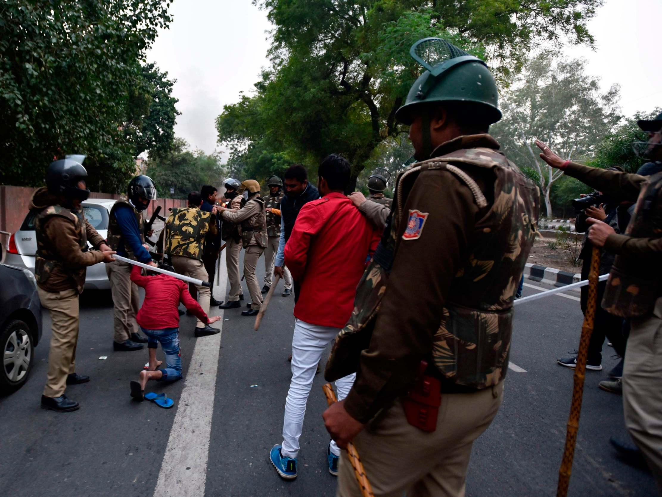 Police clash with demonstrators in New Delhi