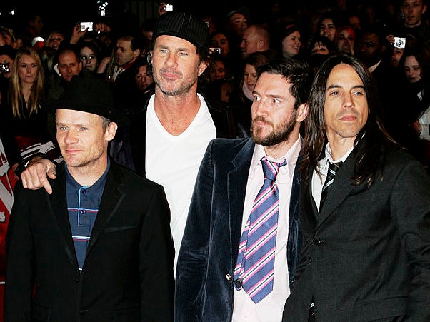 John Frusciante (second from right) stands alongside Red Hot Chili Peppers bandmates Flea, Chad Smith and Anthony Kiedis at the 2007 Brit Awards
