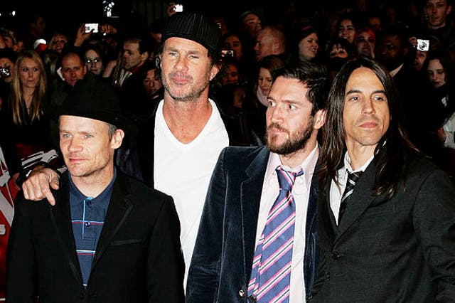 John Frusciante (second from right) stands alongside Red Hot Chili Peppers bandmates Flea, Chad Smith and Anthony Kiedis at the 2007 Brit Awards