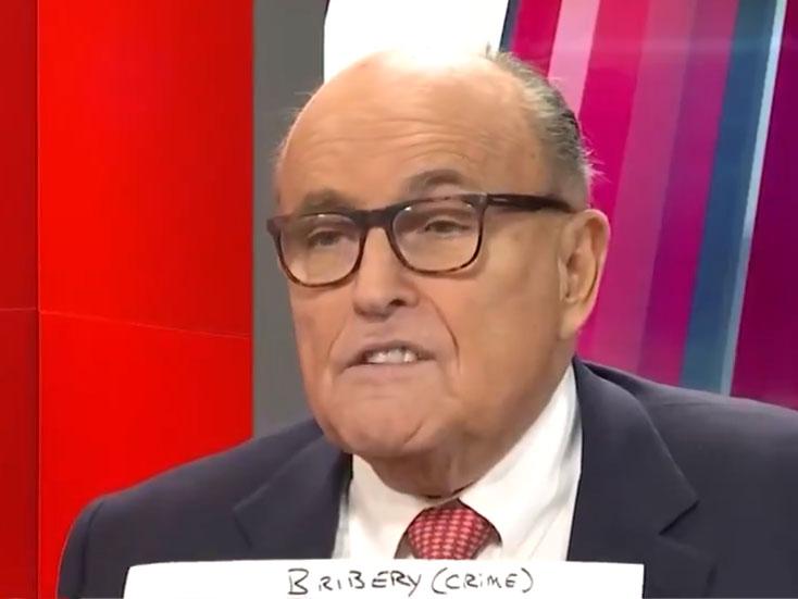 Rudy Giuliani appeared on One America News to produce what he claims is evidence of corruption by Joe Biden