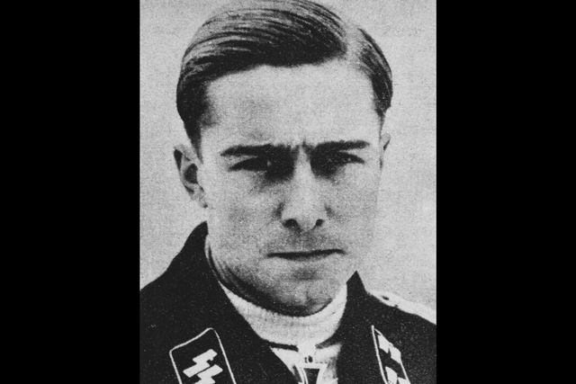 Joachim Peiper of the Waffen-SS, pictured wearing the Iron Cross awarded to him in 1940