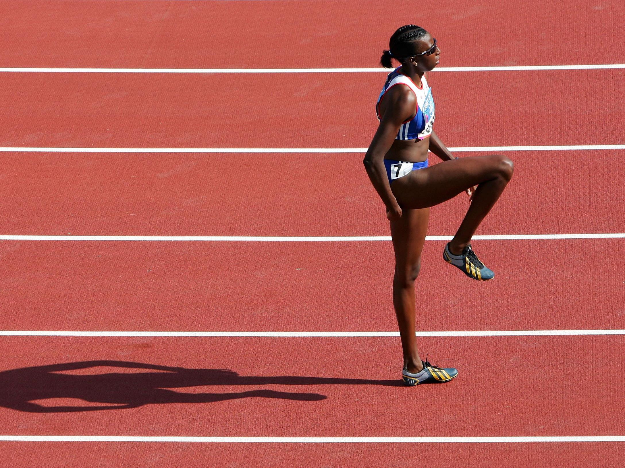 Donna Fraser warms up before her 400m semi-final in Athens