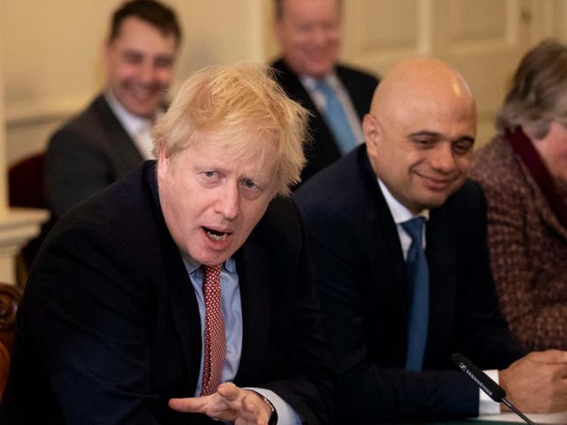 Boris Johnson speaks during his first cabinet meeting since the general election, inside 10 Downing Street