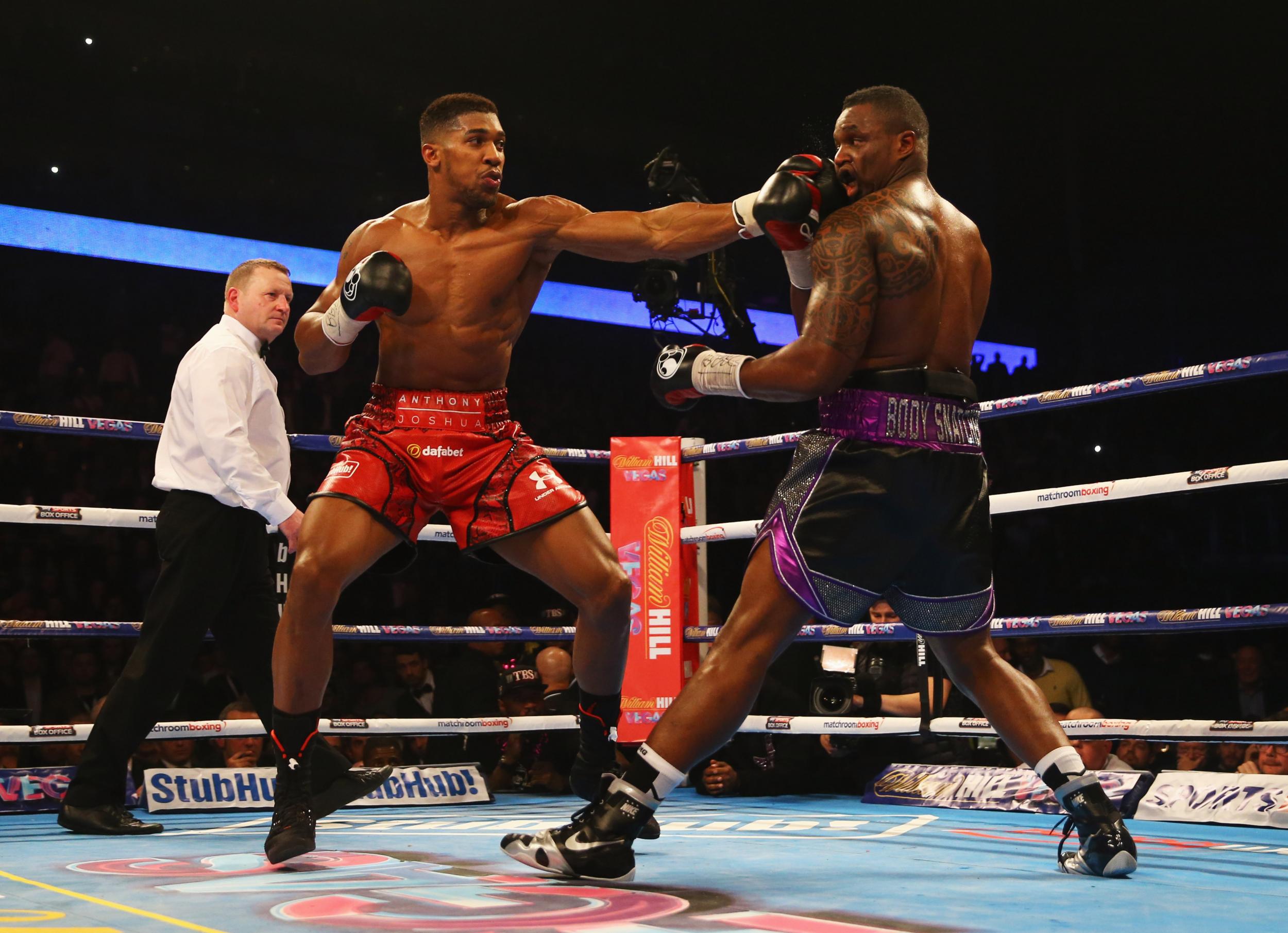 Dillian Whyte (right) has predicted that Anthony Joshua will stop Oleksandr Usyk