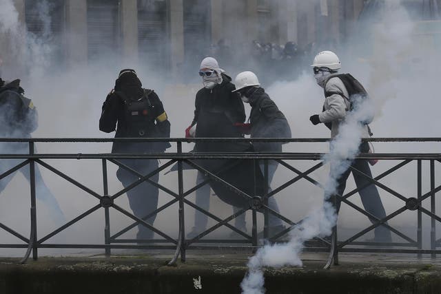 Protesters clash with police during a protest in Rennes, western France
