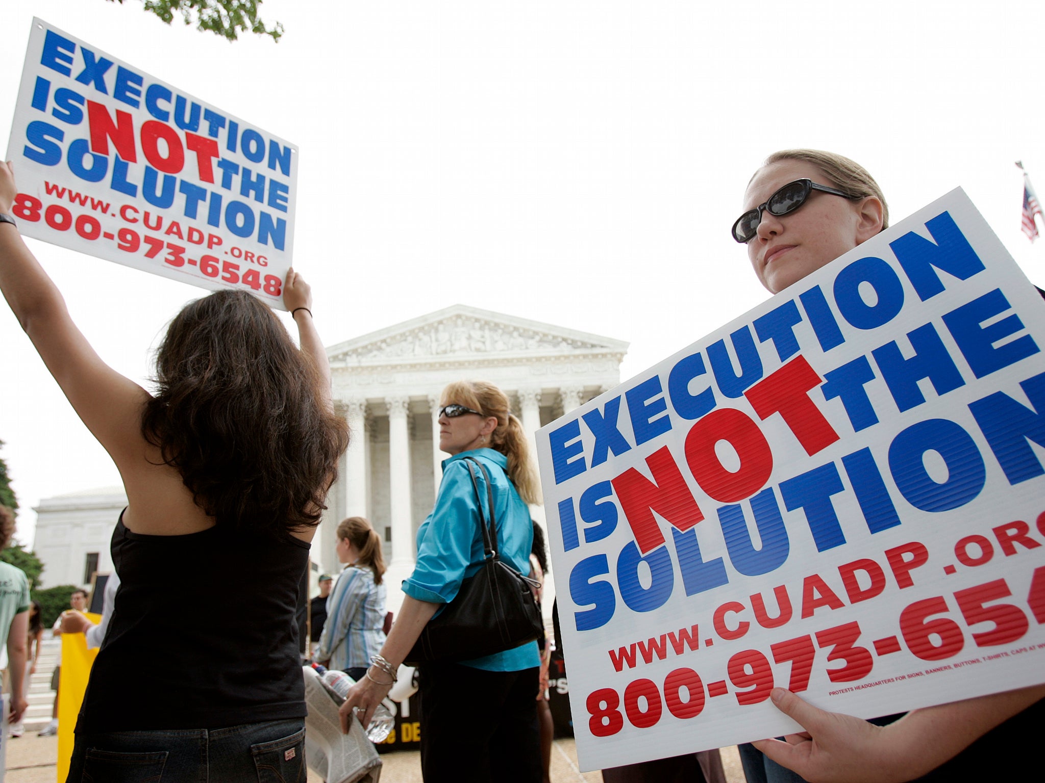 Anti-death penalty activists rally outside the US Supreme Court