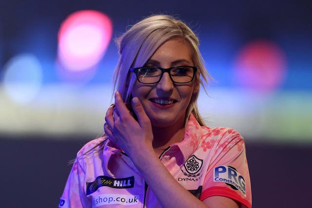 Fallon Sherrock became the first woman to win a match at the World Darts Championship
