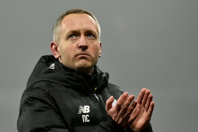 Liverpool's Under 23 coach Neil Critchley applauds to supporters at the end of the 5-0 defeat at Aston Villa