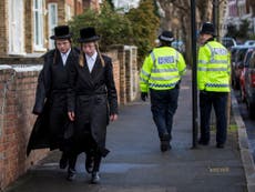 Two boys charged after repeatedly punching rabbi in antisemitic attack