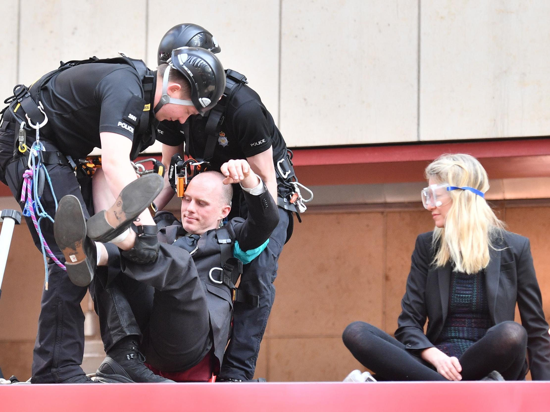 Extinction Rebellion protesters convicted &apos;with regret&apos; by jury after gluing themselves to train in London