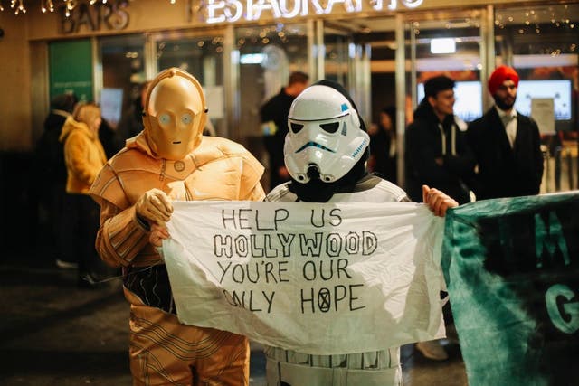 Eight filmmakers from the Extinction Rebellion UK group, Film Strike for Climate, occupied the red carpet at the Star Wars premiere in London