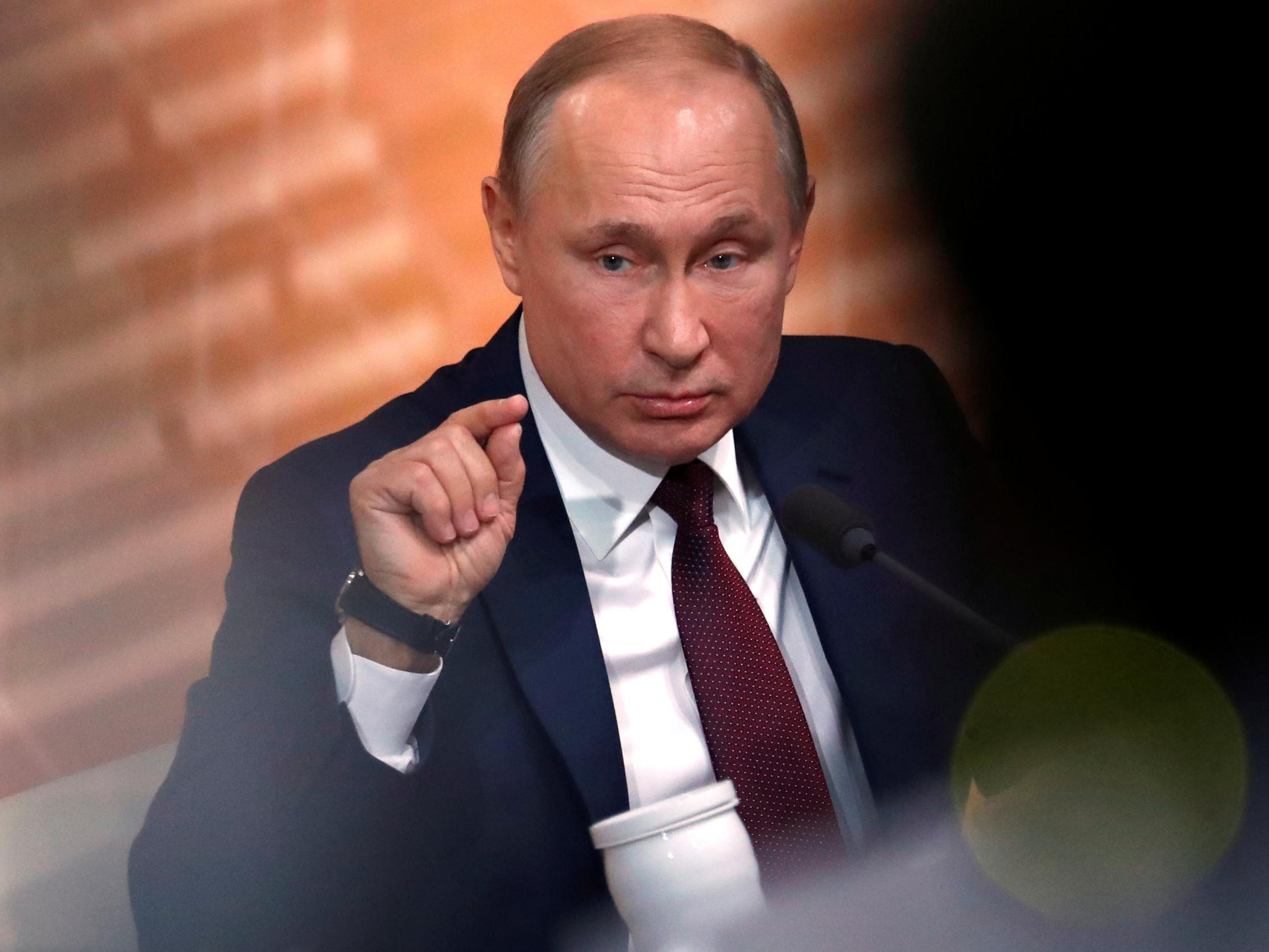 Putin says rule limiting him to two consecutive terms as president &apos;can be abolished&apos;