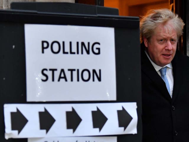 Boris Johnson leaves a polling station after voting in the general election
