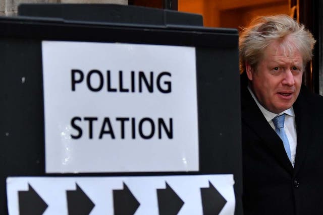 Boris Johnson leaves a polling station after voting in the general election