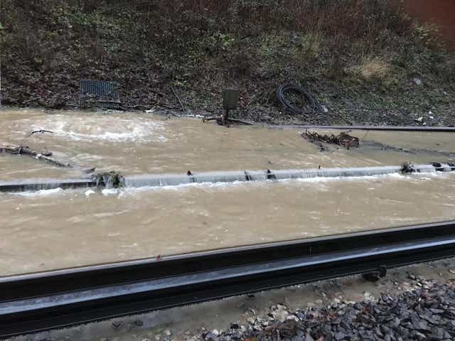 Flooded train tracks is causing massive disruption in south east England