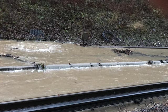 Flooded train tracks is causing massive disruption in south east England