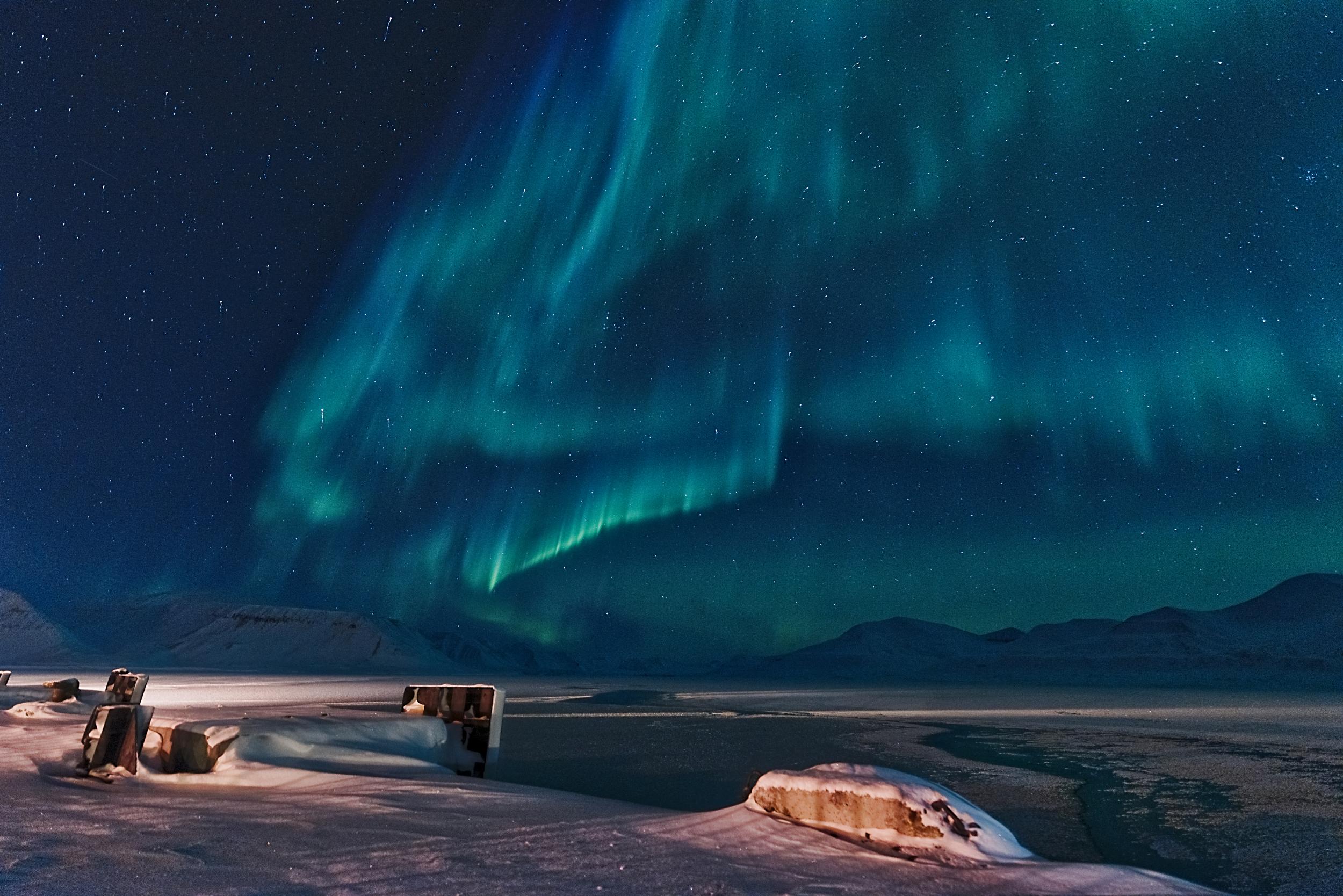 Aurora glistens on the horizon