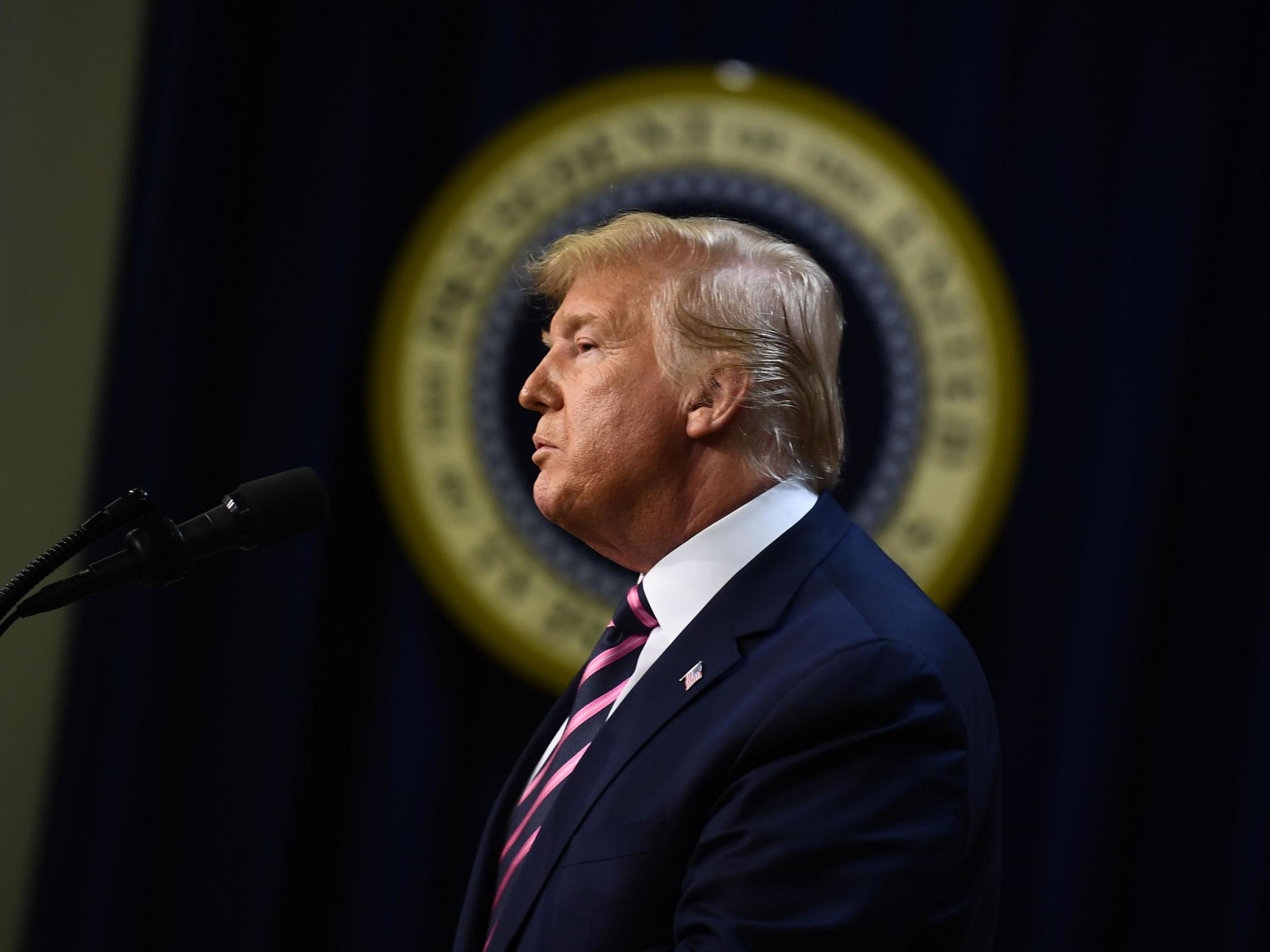Trump &apos;shellshocked&apos; after impeachment, White House aides say