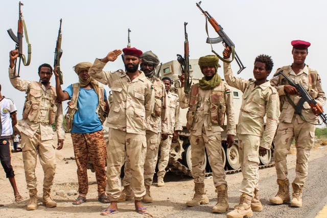 Sudanese soldiers fighting alongside Yemen's Saudi-backed pro-government forces against the Houthi rebels near Al-Jah, southwest of the Red Sea port city of Hodeidah