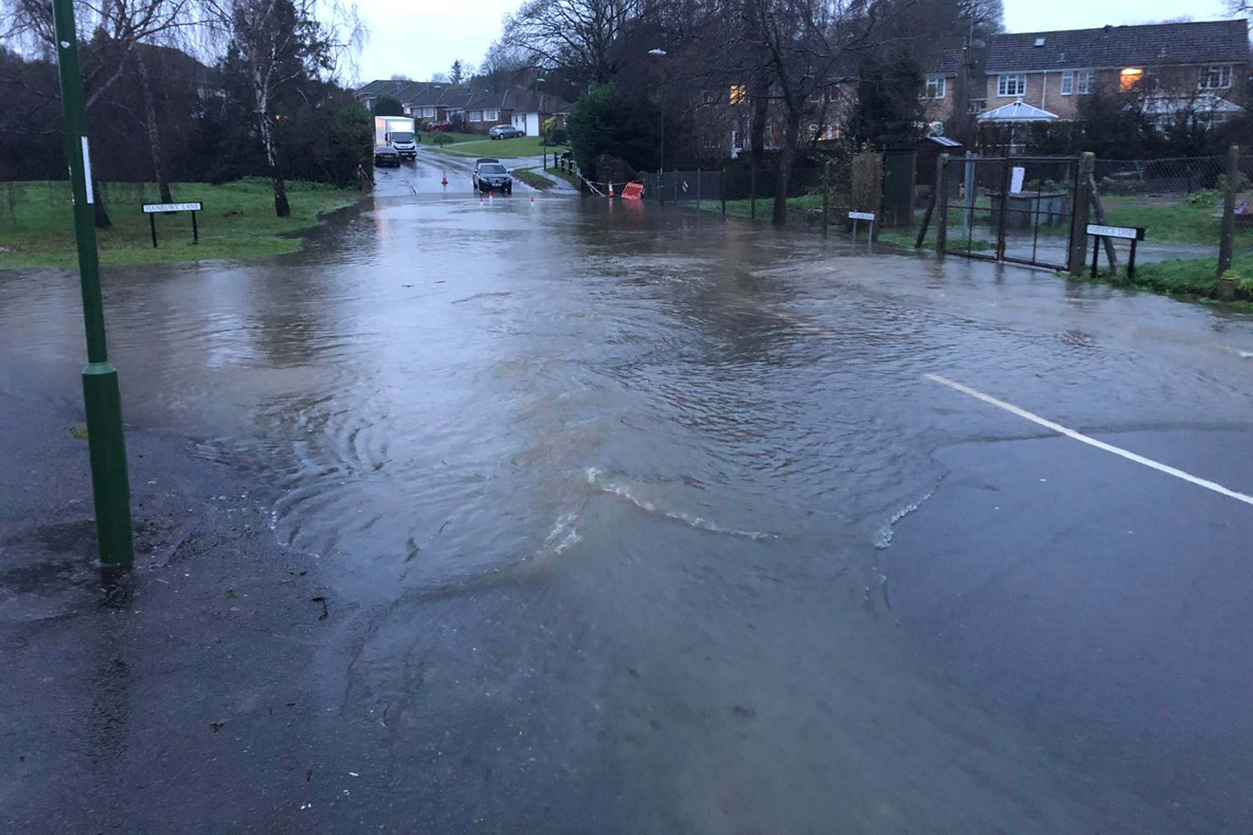 Roads submerged in West Sussex as millions expected to face delays as Christmas holiday getaway begins