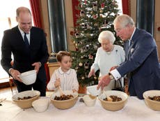 Prince George pictured making Christmas pudding with the Queen
