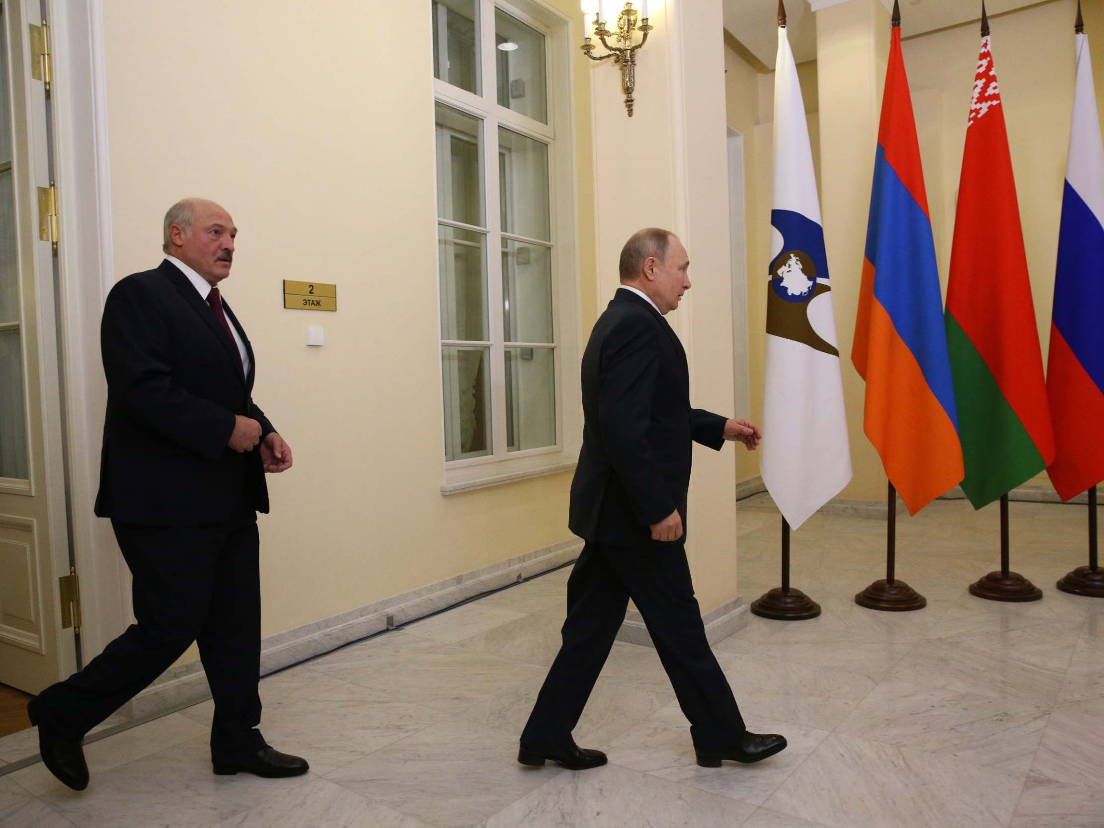 Alexander Lukashenko and Vladimir Putin in St Petersburg on Friday