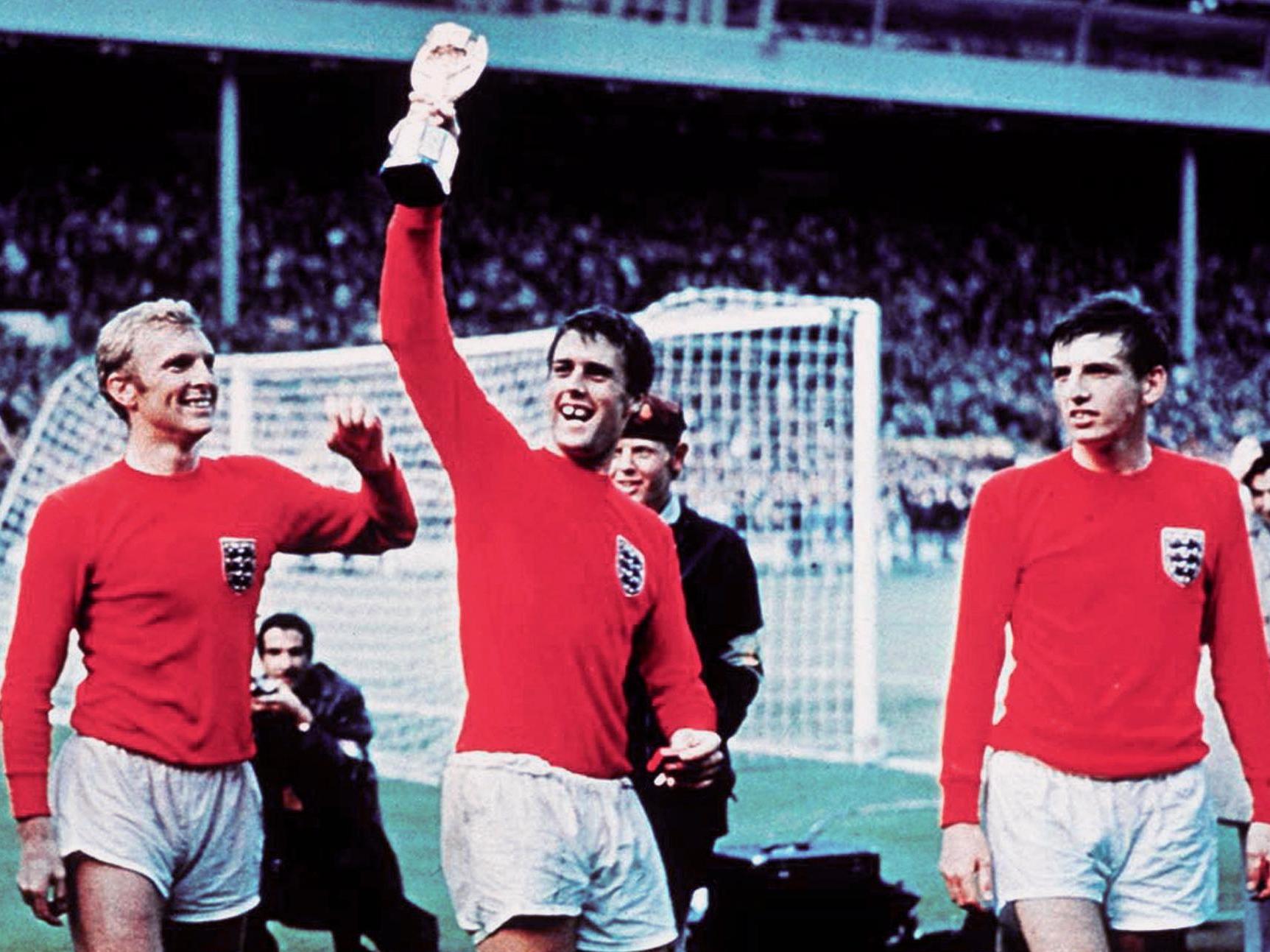Martin Peters, right, with Bobby Moore and Geoff Hurst at Wembley