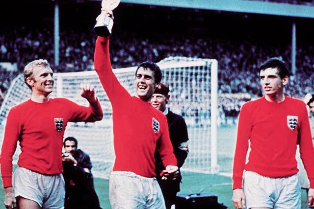 Martin Peters, right, with Bobby Moore and Geoff Hurst at Wembley