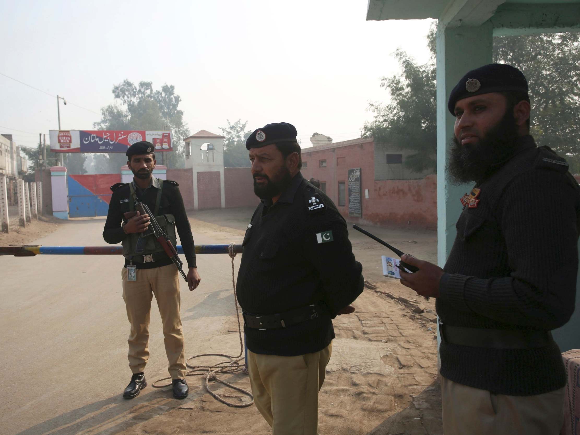 Pakistani police officers stand guard outside Multan jail where former university lecturer Junaid Hafeez was convicted of blasphemy and sentenced to the death penalty, 21 December, 2019.