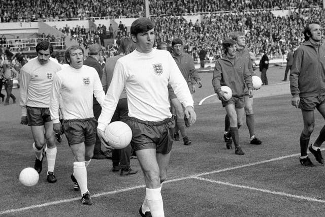 Martin Peters leads England out at Wembley for his first match as captain in May 1971