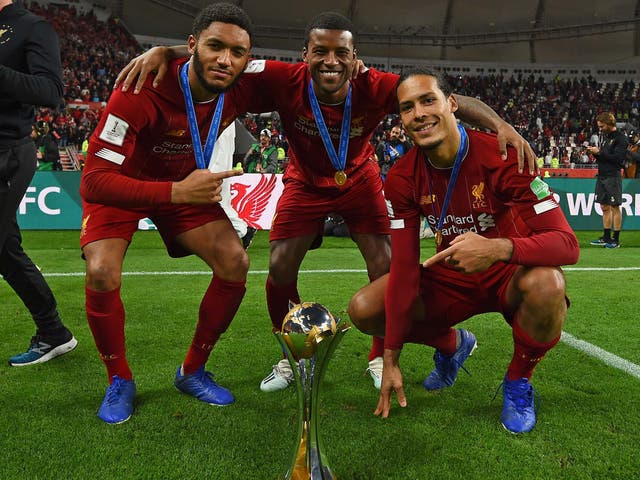 Joe Gomez, Georginio Wijnaldum and Virgil van Dijk celebrate Liverpool's Club World Cup win