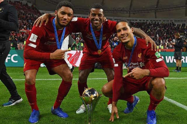 Joe Gomez, Georginio Wijnaldum and Virgil van Dijk celebrate Liverpool's Club World Cup win