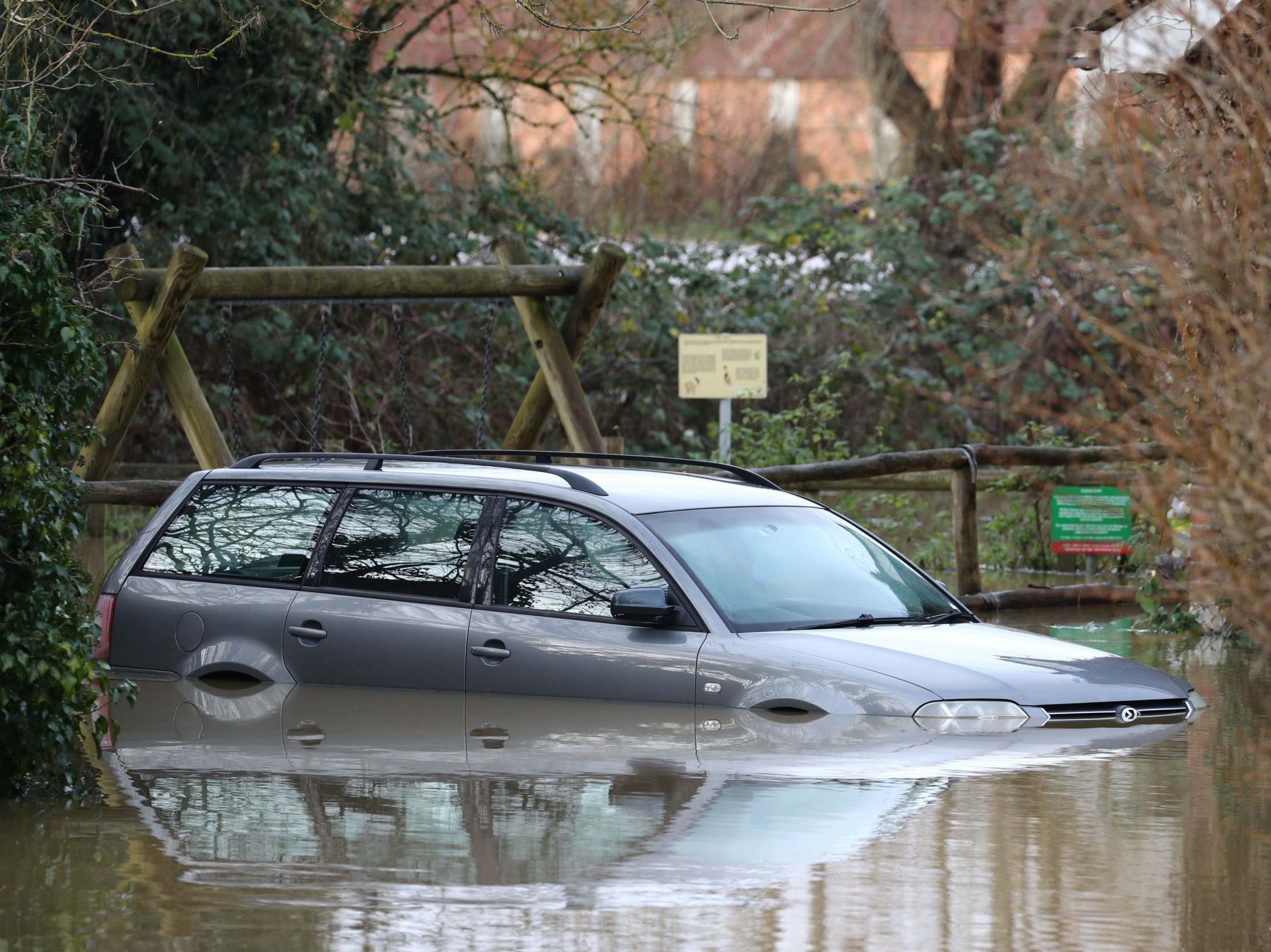 A submerged car in Yalding, Kent, after the area flooded following heavy rain